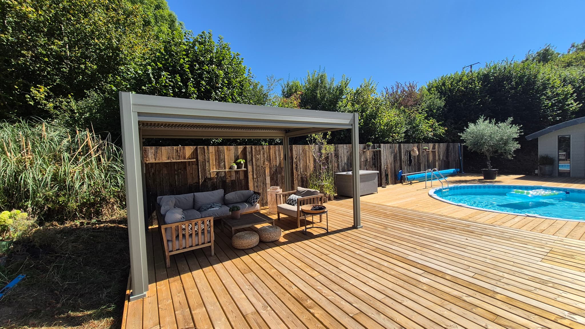 Pergola and lounge seating on the new deck