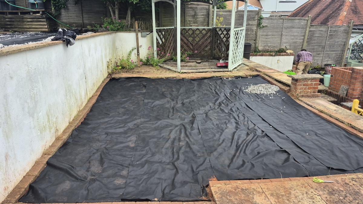 Membrane being laid across both levels