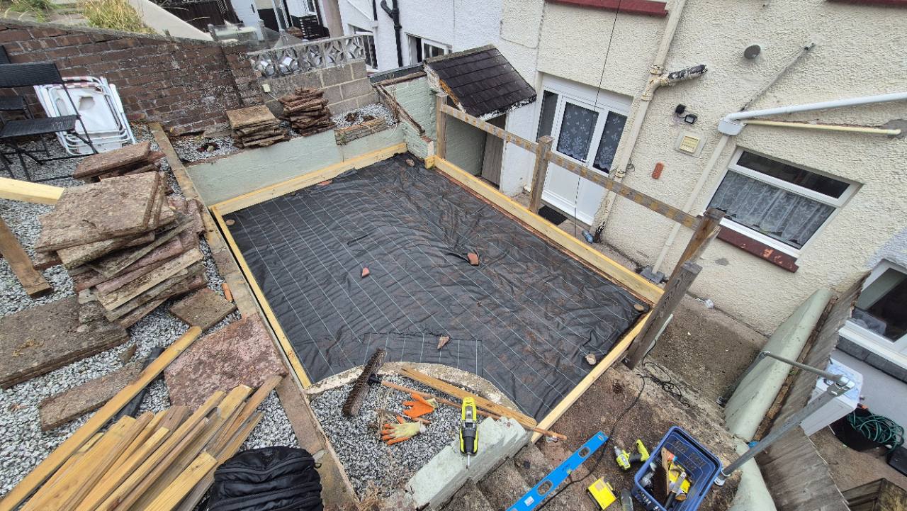 Old paving lifted and ground prepared for the deck
